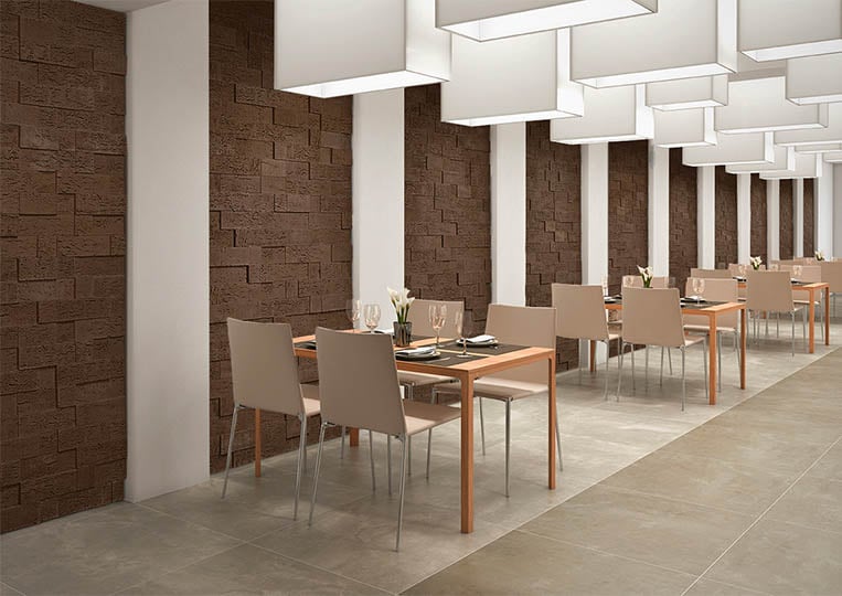 Intérieur de restaurant avec un pant mur en pierre de parement acl stone cork café foncé