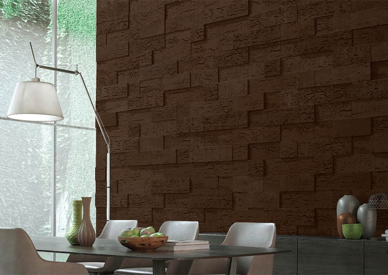 Salle à manger avec un pant de mur en pierre de parement acl stone cork café foncé