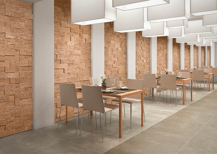 intérieur de restaurant avec pants de murs en pierre de parement acl stone cork clair