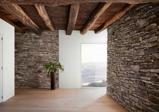 Intérieur d'une pièce avec des murs en pierre de parement acl teira gris