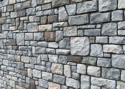 Pant de mur extérieur en pierres reconstituées